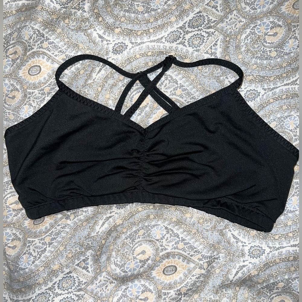 Handful sports bra in black, adjustable criss-cross straps
